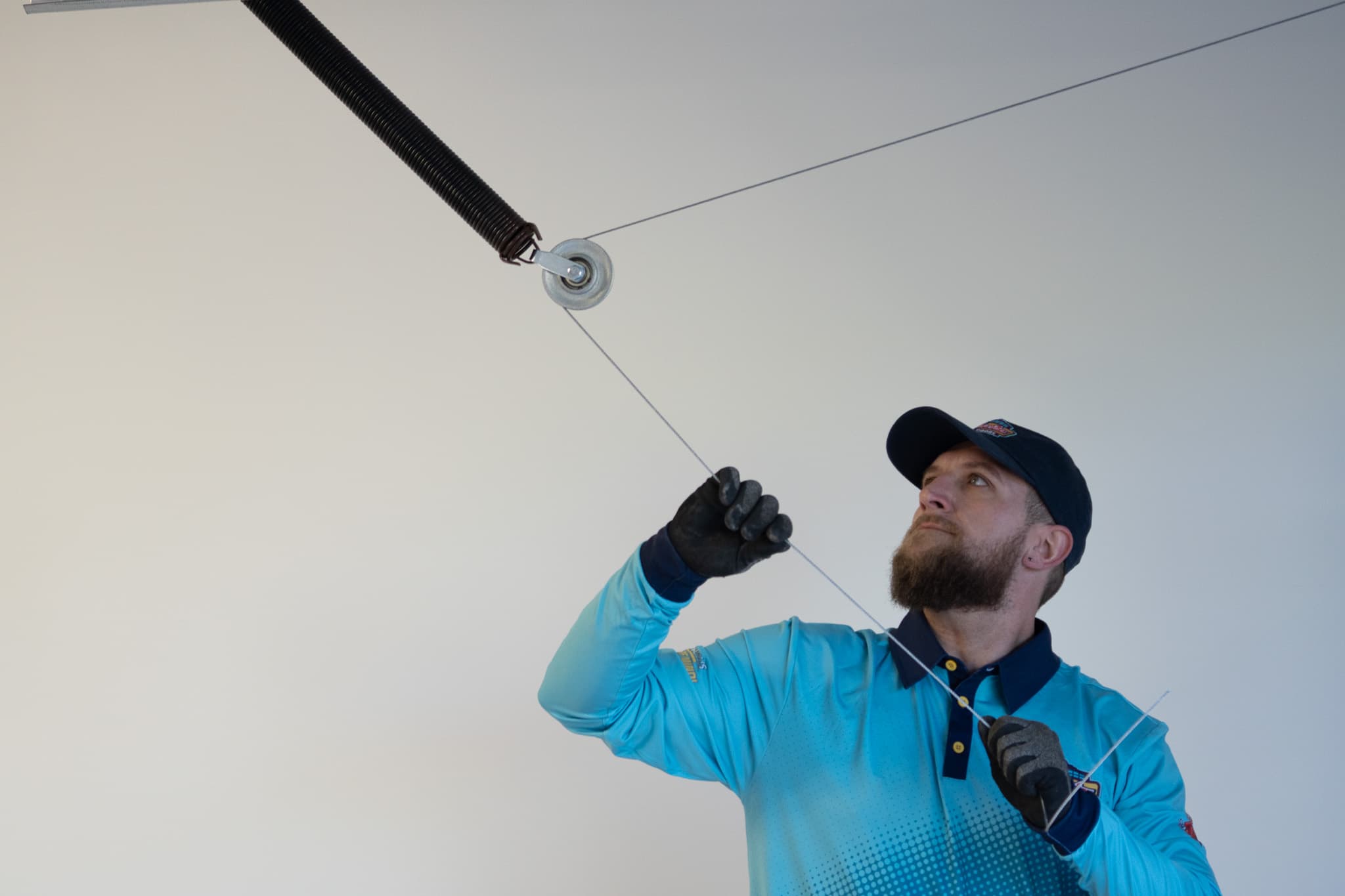 HighLevel technician performing cable repair